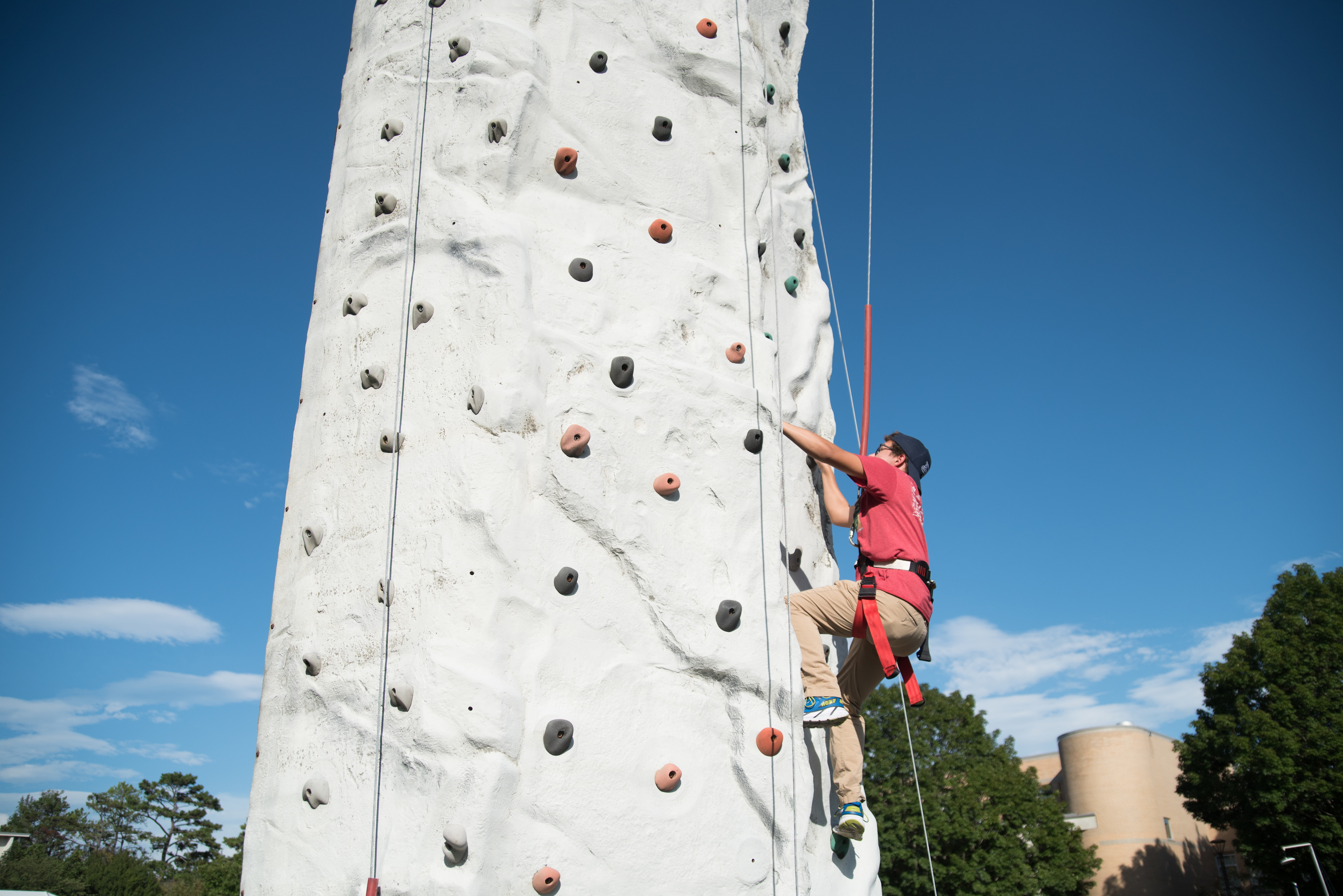 Students on the climbing wall at Rockypalooza