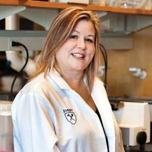 Dana Boyd Barr with labcoat