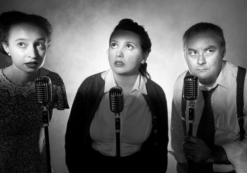 Actors in front of microphones