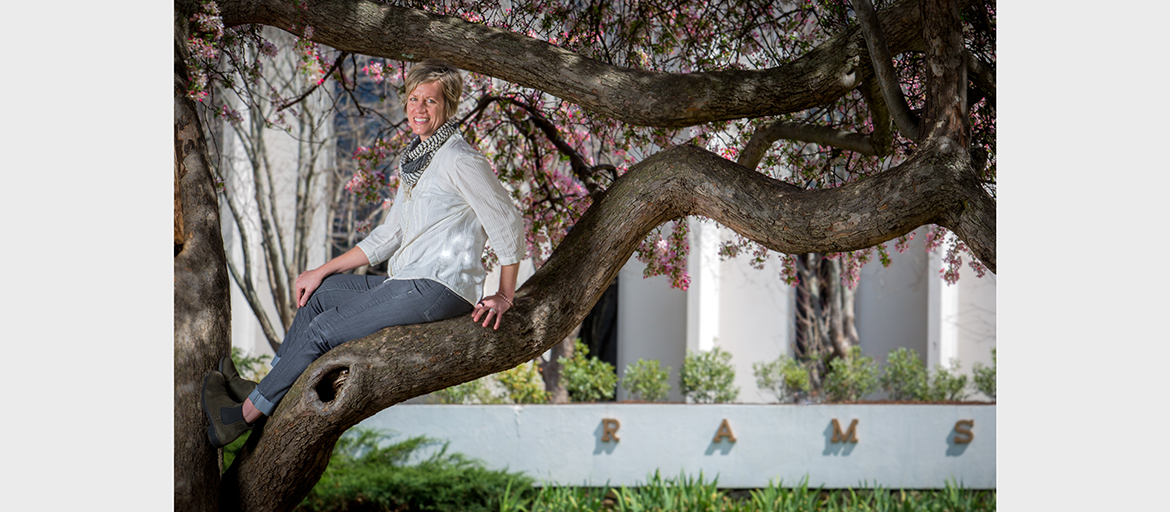 Marshall, Alli at Ramsey dogwood Alli Marshall poses on a tree branch outside of Ramsey Library