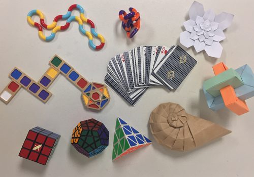 Images of cards, and objects displaying mathematical patterns