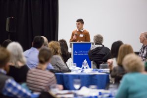 UNC Asheville student Melchor Gamez speaks at the luncheon