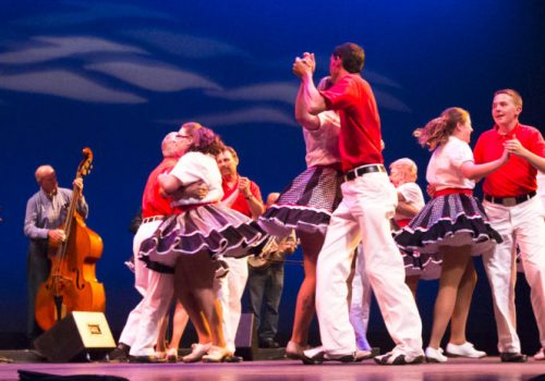 musicians and dancers on stage