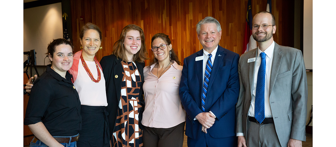 group photo: Morgane Marshall, SEC Co-Director; Sonia Marcus, Director of Sustainability; Kelsey Hall, UNCA Divest member; Erika Covey ESG Fund Manager for the Student Environmental Center; John Pierce, Vice Chancellor for Administration and Finance; Ben Underwood, Associate Vice Chancellor for Advancement Operations