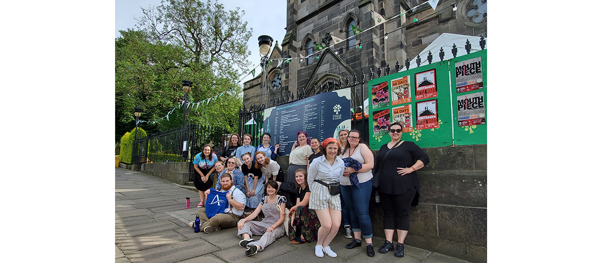 UNC Asheville students and faculty pose outside of the Greenside Parish Church in Edinburgh, Scotland, where they are performing four shows as part of the famed Festival Fringe.
