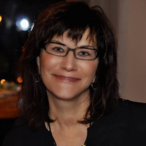 a headshot of a woman smiling