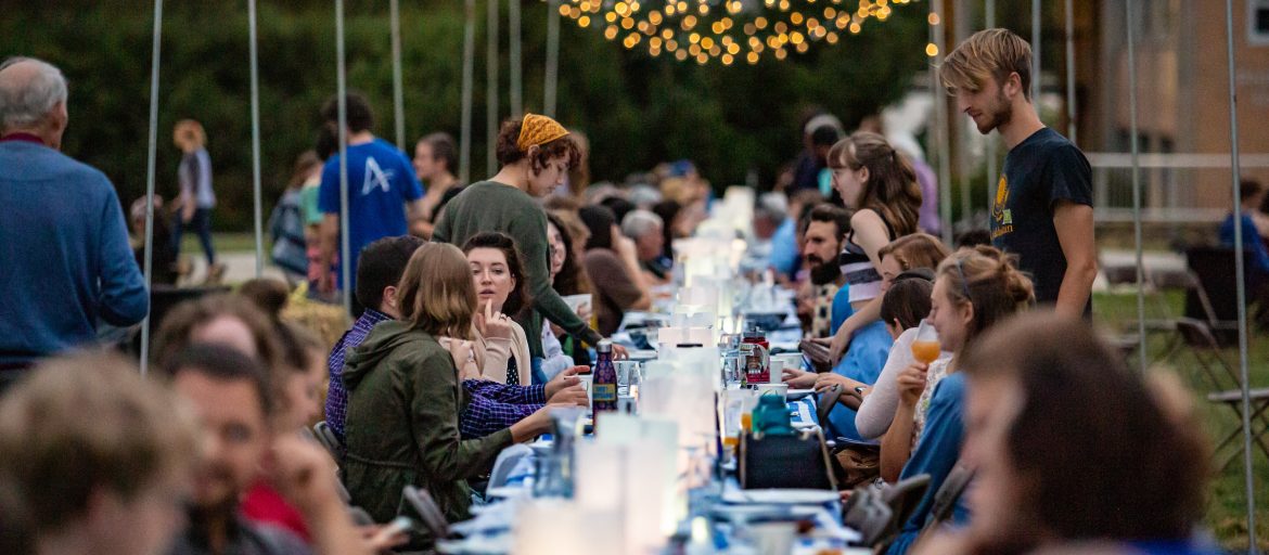 People eating at the Farm to Table dinner.