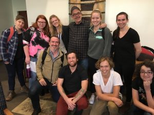 a group photo of smiling people