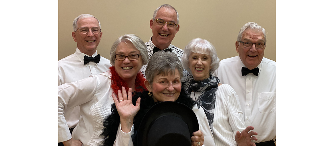 RCS Nov 2019 web Six members of the Reuter Center Singers pose in formal attire with cheery smiles