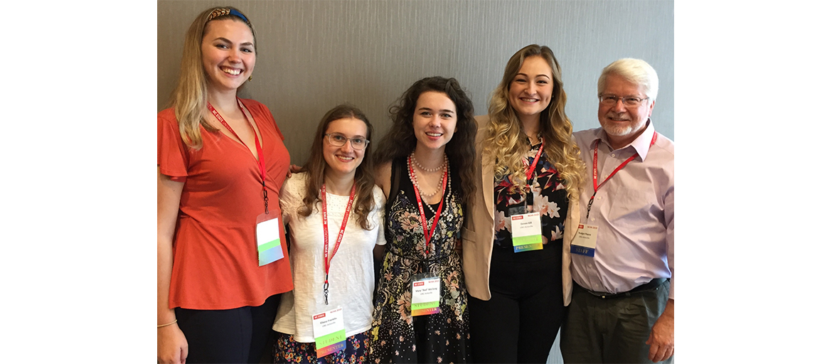 a group of students with a professor