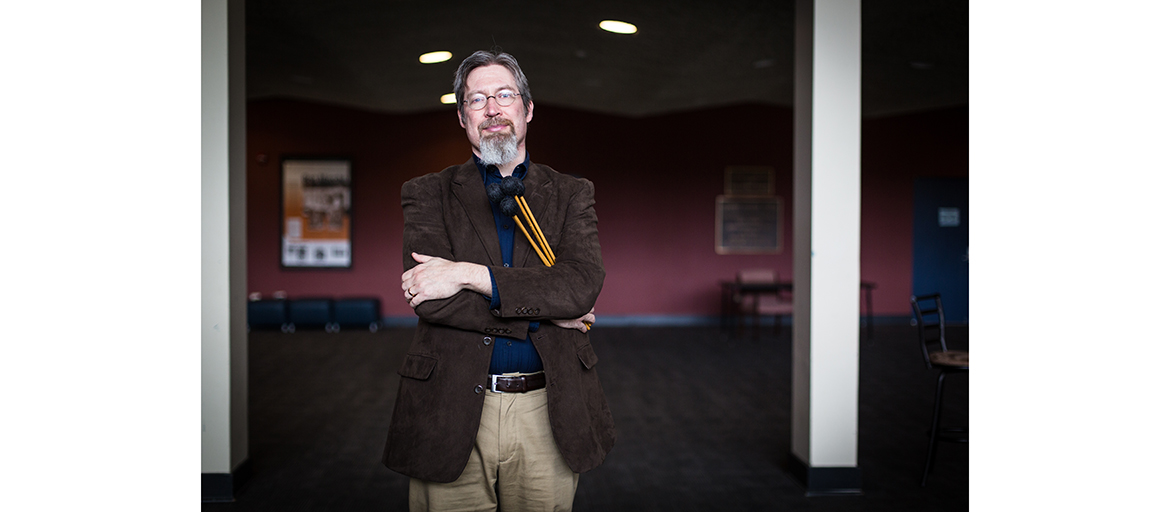 Matthew Richmond holding his vibes mallets