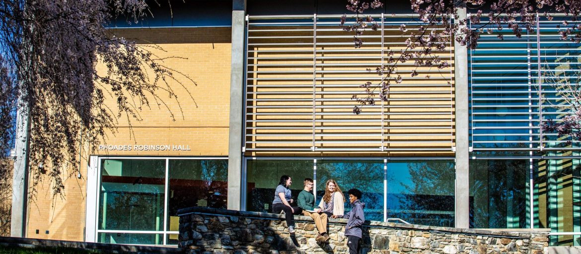 Spring-Blossoms-2019-6473-1-scaled-e1582555625755-1170×512 student on campus