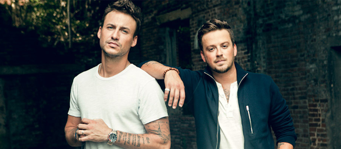 LOVE_THEFT_K_1165_1164 two young white men, likely musicians, actively not smiling