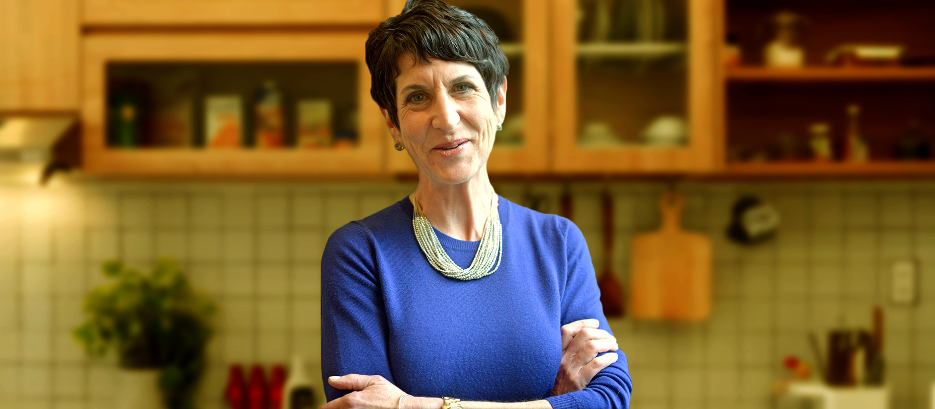 marciecohen_cd_eventpost Portrait photo of Marcie Cohen standing in a very well organized kitchen