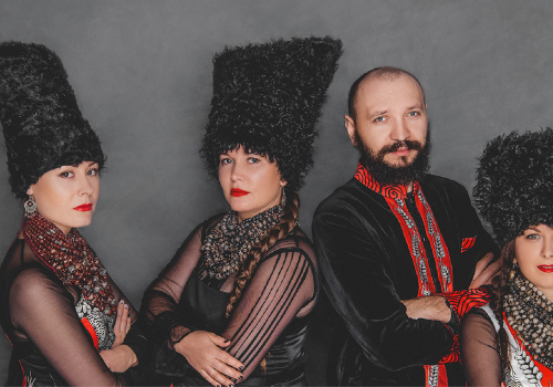 Group photo of the Band DakhaBrakha in their matching formal cultural attire