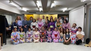 a photo of Ona Elkins with a group of students on a study abroad trip in Japan.