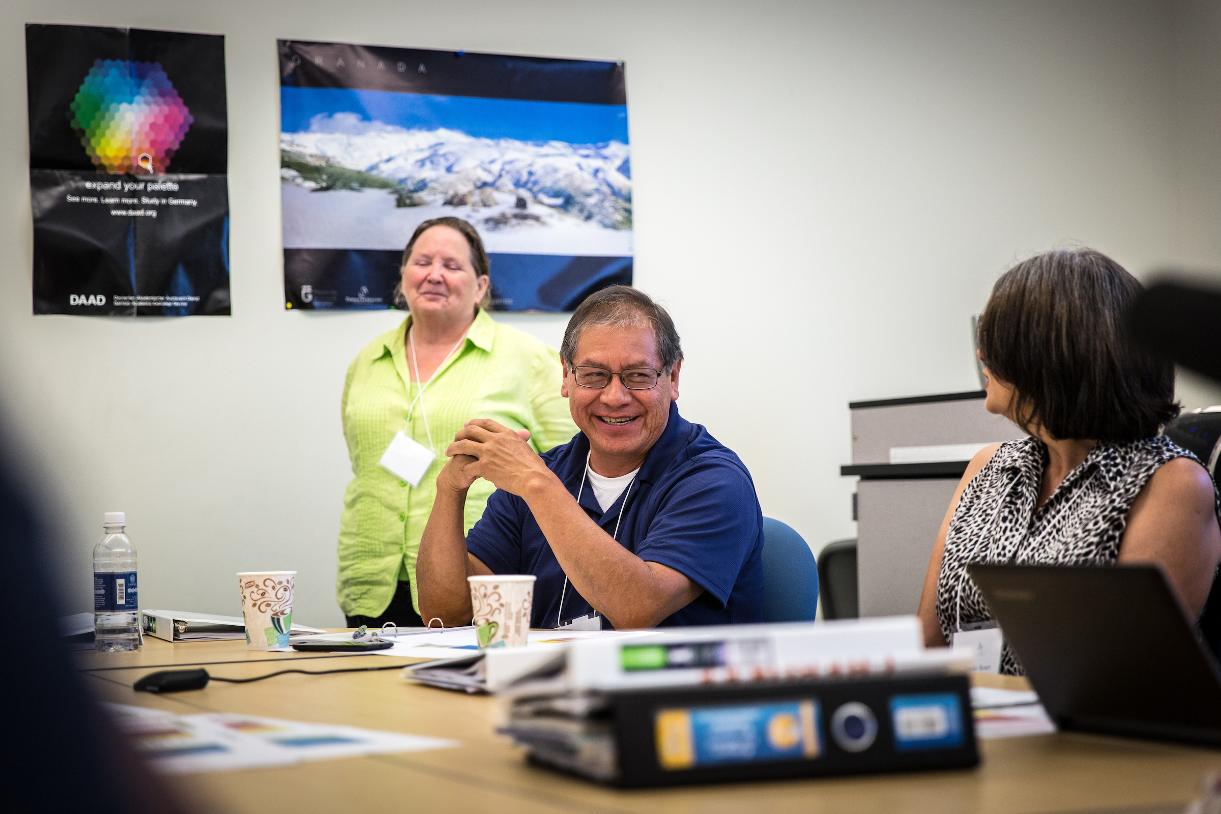 A group of faculty in a meeting.