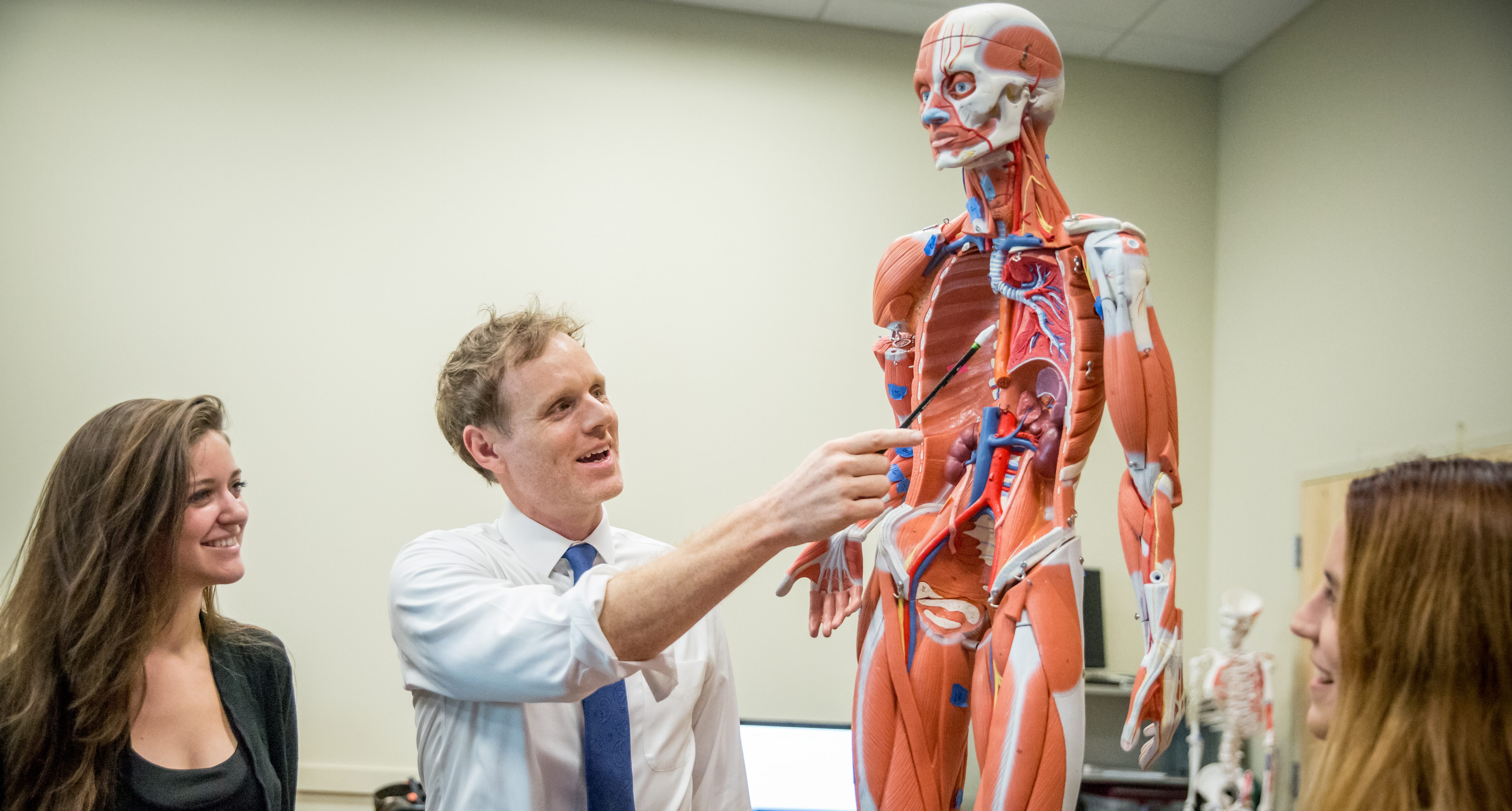 Jason Wingert teaching with a skeleton model