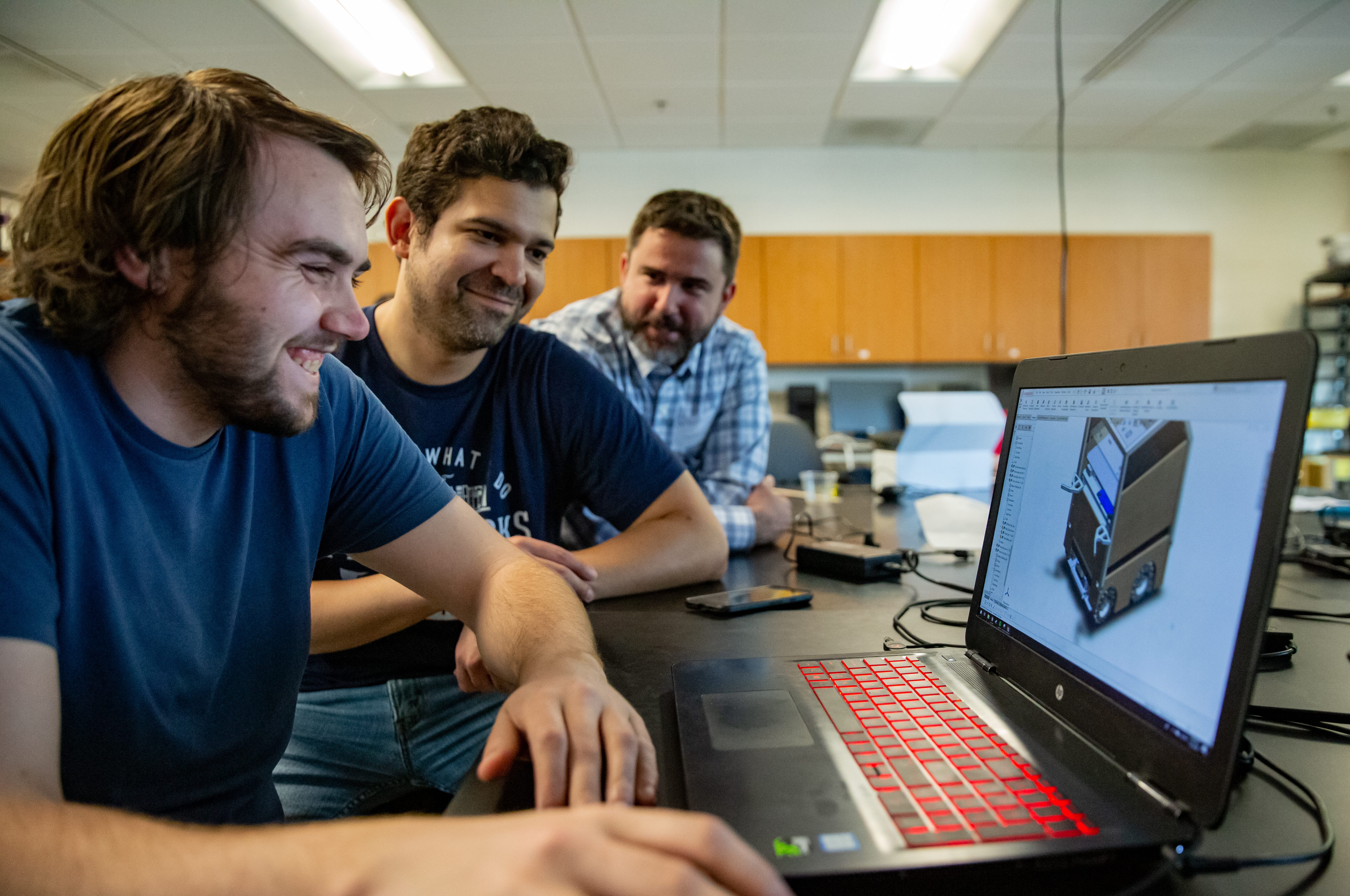 Engineering students working on a project
