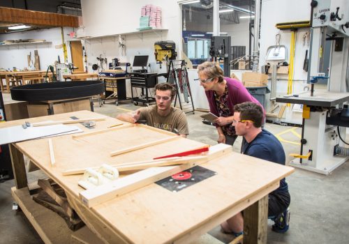 Social entrepreneurship students with Mary Lynn Manns in STEAM Studio
