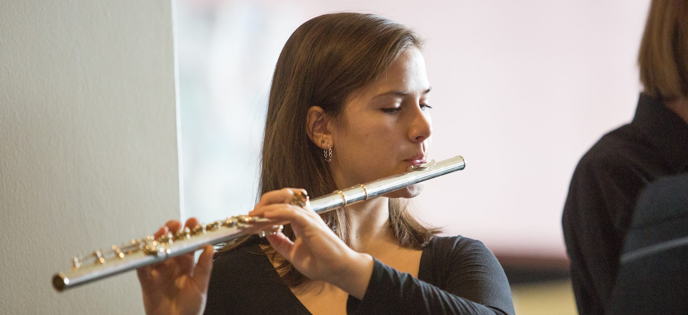Woman playing flute